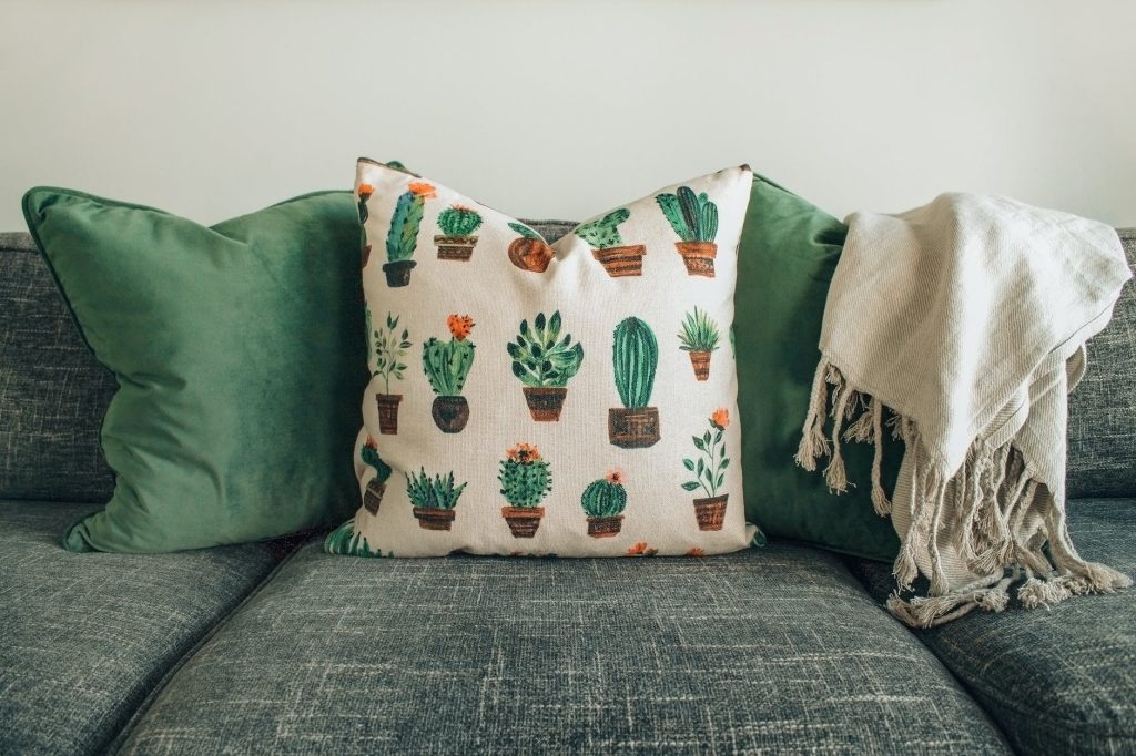 white and green throw pillows